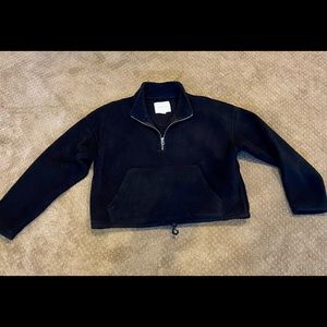 Black, fuzzy pull over jacket